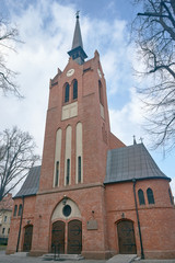 Fototapeta na wymiar Tower neo-Gothic church in Poznan.