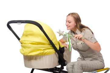 Woman with pram isolated on white