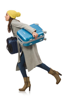 Woman with suitcase ready for winter vacation