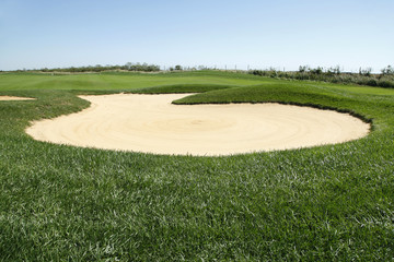 Sand bunker on the golf course