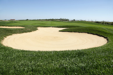 Sand bunker on the golf course