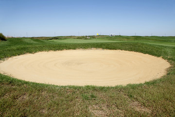 Sand bunker on the golf course