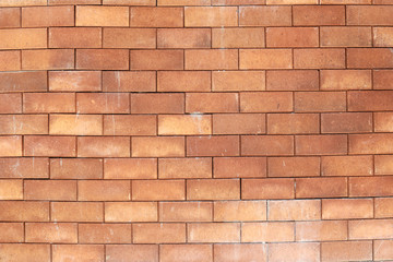 Brown brick wall foully.