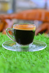 coffee cup on artificial Turf