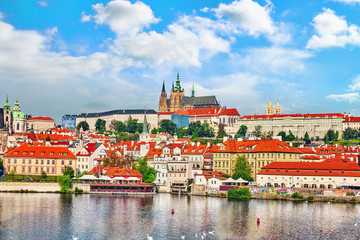 Fototapeta na wymiar View of Prague Castle from waterfront- famous historic bridge th