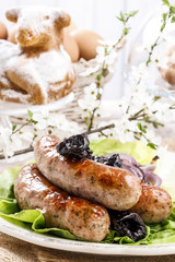 Sausage with plums and onion