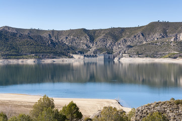 Views of Buendia Reservoir, in the upper waters of the river Tagus, Cuenca, Spain. The surface area of the reservoir measures 8,194 hectares, and it can hold a total of 1,638 cubic hectometres