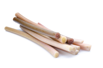 portion cut lotus stem for cooking on white background