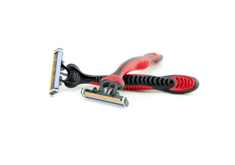 two red and black disposable shaving razor isolated on white background