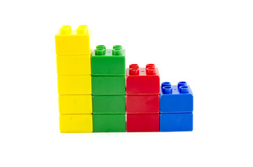 colorful plastic building toys isolated on white background