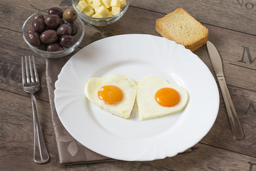 Fried eggs in the shape of hearts