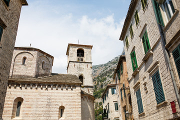 Fototapeta na wymiar Old stone medieval buildings in old town Kotor Montenegro