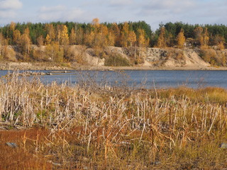 flooded quarry in autumn
