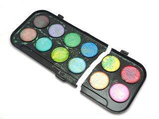 watercolor paints on a white background