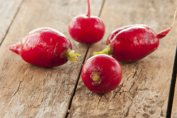 radishes on wooden table