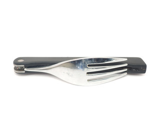 Folding travel fork on a white background