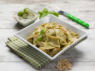 testaroli with pesto sauce,  selective focus