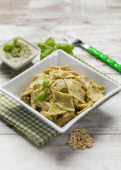 testaroli with pesto sauce,  selective focus