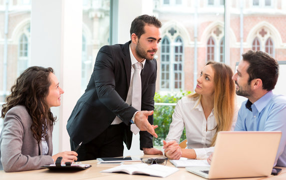 Group of business people working together at the office