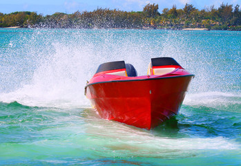Fast motor boat on Indian Ocean near Ile Aux Cerfs Island ( Mauritius Island).
