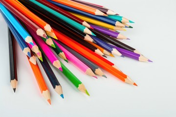 Drawing supplies: many different colored pencils.