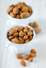 almonds on wooden surface