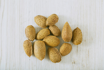almonds on wooden surface