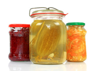 Fototapeta na wymiar Jars with pickled vegetables