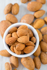almonds on wooden surface