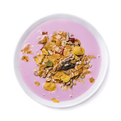 Muesli with yoghurt and fruit pieces isolated on white background