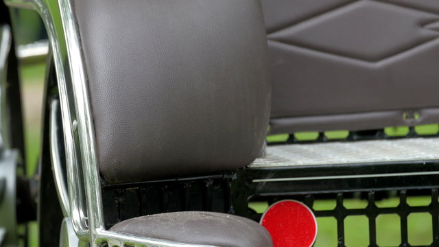 The leather seat of the modern carriage. This is where the passengers will sit while travelling on the horse carriage
