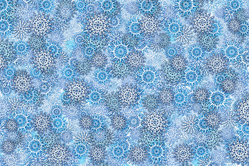 Blue winter Christmas background with lots of snowflakes