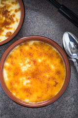 Porcelain rustic pot with homemade creme brulee