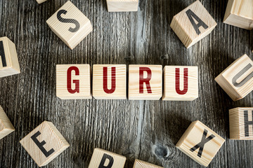 Wooden Blocks with the text: Guru