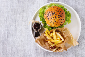 Homemade hamburger with french fries © Natasha Breen