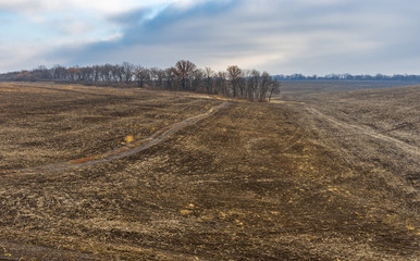 Agricultural landscape with harvested fields in Ukraine at autumnal season
