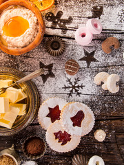 Christmas sweets over wooden background, close-up.