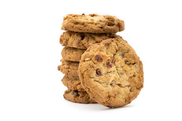 Oatmeal cookies with cranberries on a white background.