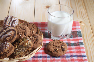 Glass with milk and cookies