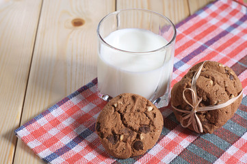 Glass with milk and cookies
