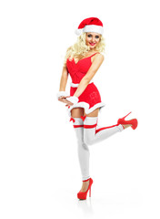 Beautiful sexy girl wearing santa claus clothes. Christmas Woman