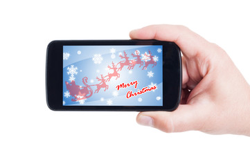 Merry Christmas greeting on phone screen
