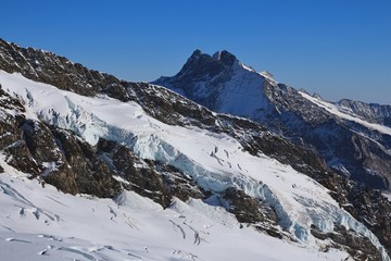 Fototapeta na wymiar Glacier and high mountain, view from the Jungfraujoch