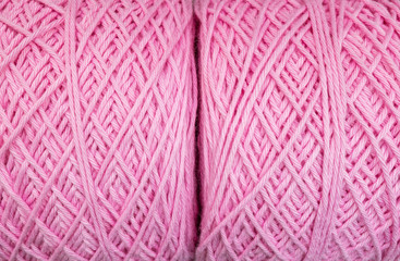 Closeup pile of pink yarn texture background