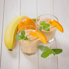  Healthy food concept: Fresh smoothies from persimmon , banana, yogurt
