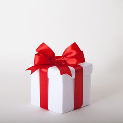 Gift box with ribbon and bow. Present.