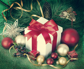 Fototapeta na wymiar Christmas Presents and Ornaments on retpo Background