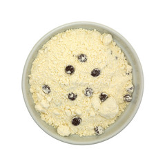 Chocolate chip cookie mix in an old bowl