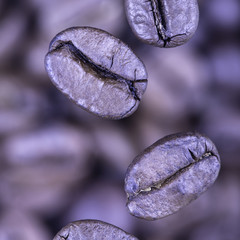 falling coffee beans closeup