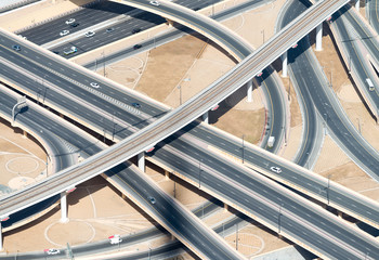 Naklejka premium Aerial view of highway interchange of modern urban city